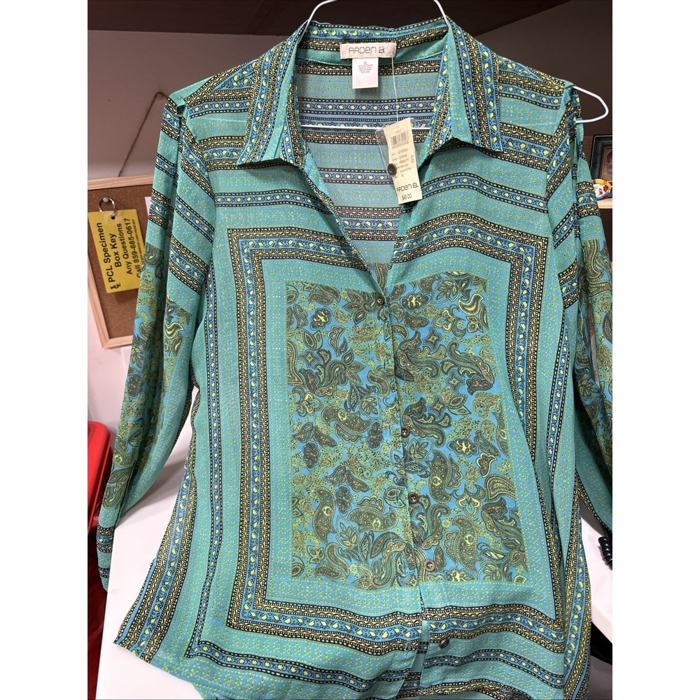 Arden B Woman's Blouse With Cut Outs‎ On. The Sleeves